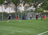 Laatste training S.K.N.W.K. JO11-1JM (partijtje tegen de ouders) van maandag 27 mei 2024 (82/137)